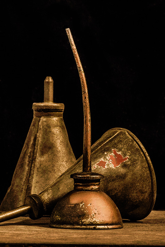 Three Old Oil Cans