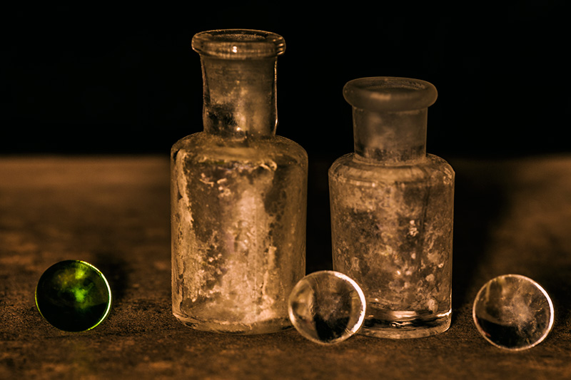 Two Old Bottles and Three Orbs